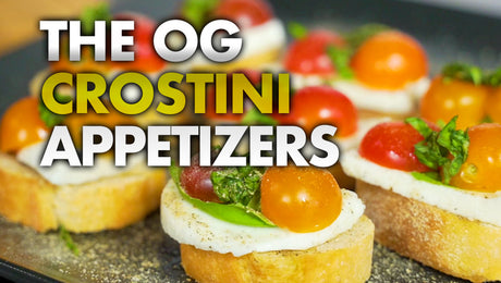 The OG Crostini Appetizer, bruschetta caprese with tomatos, mozzarrella and fresh basil